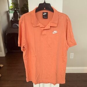 Nike orange polo men's Medium